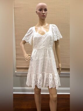 Gianna Bini white mini dress. Embroidered eyelets.sweetheart neckline. Size 2